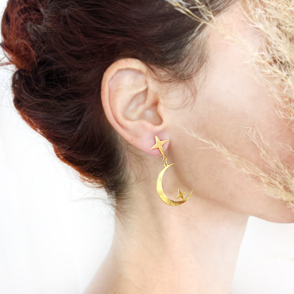 
                
                    Load image into Gallery viewer, Star and Moon Studs Earrings on a model
                
            