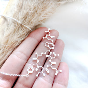 
                
                    Load image into Gallery viewer, Oxytocin Molecule Necklace Gold / Silver
                
            