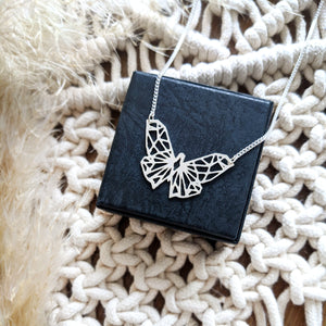 
                
                    Load image into Gallery viewer, Geometric Butterfly Necklace Gold / Silver
                
            