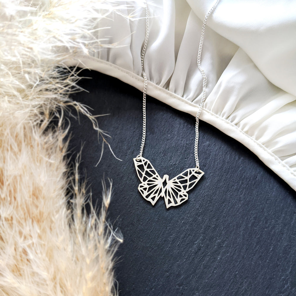 
                
                    Load image into Gallery viewer, Geometric Butterfly Necklace Gold / Silver
                
            